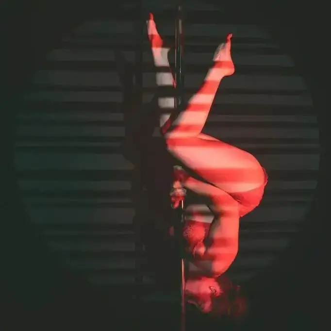 Person holding a pole